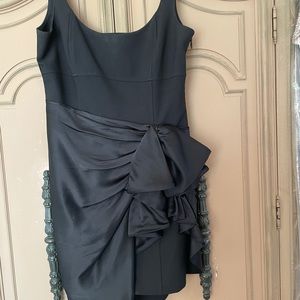 Black cocktail dress beautifully tailored from Sacks Fifth from French design
